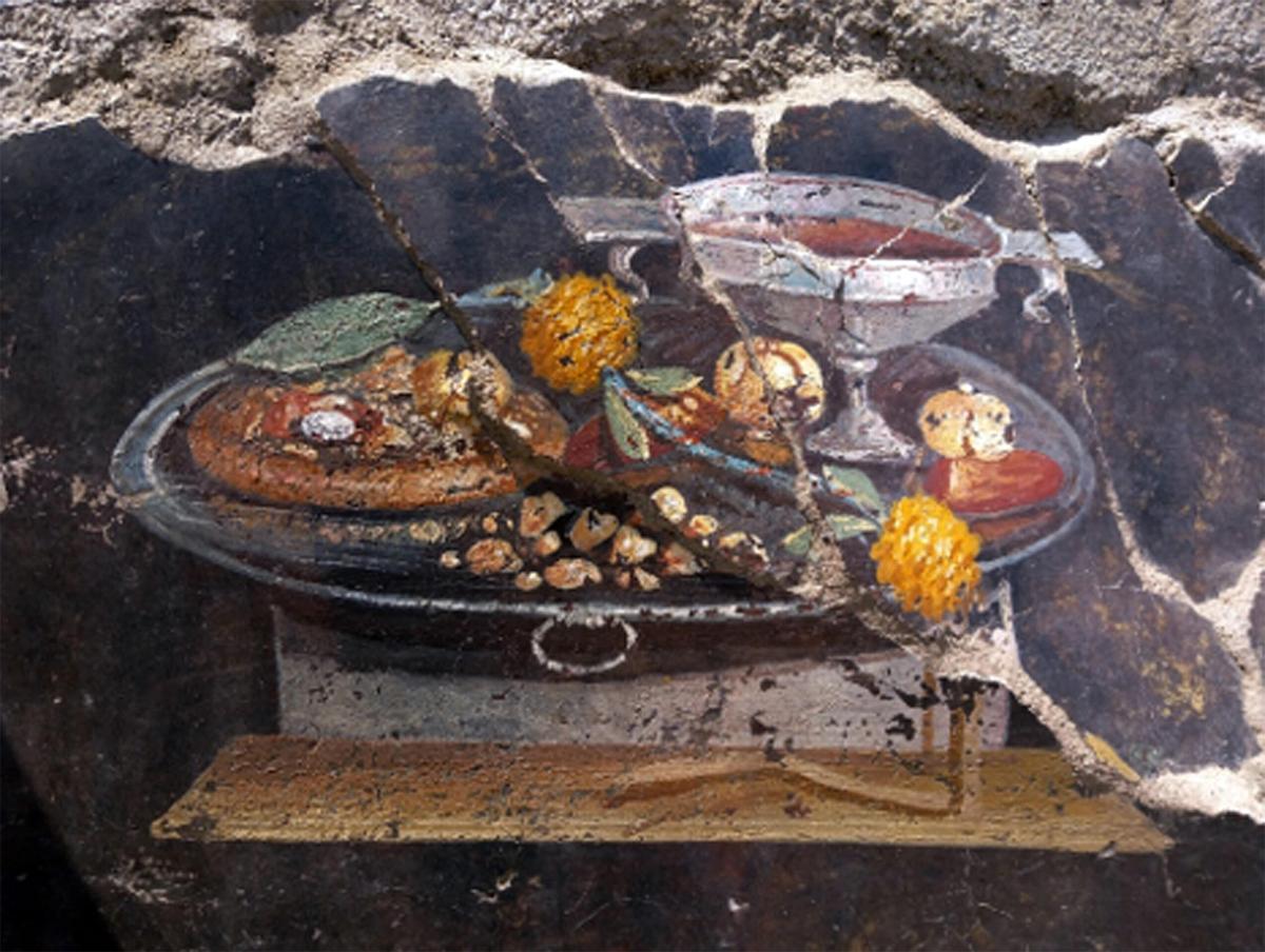 Pompei, nuova scoperta: l’affresco della pizza di 2000 anni fa sorp…